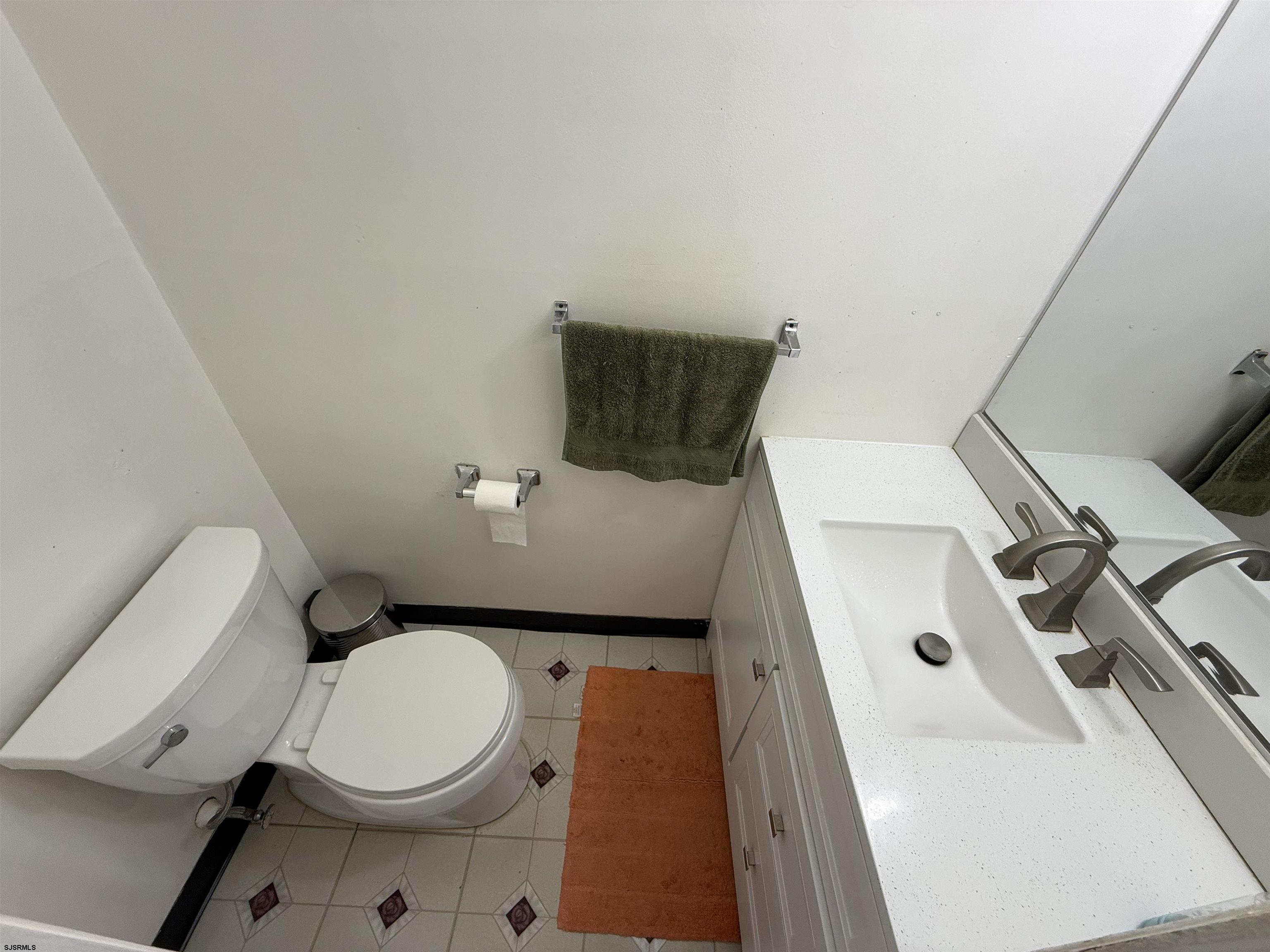 720 South New Road, Unit 3L Absecon, NJ 08201 - Photo 13 of 25 a bathroom with a toilet and a sink