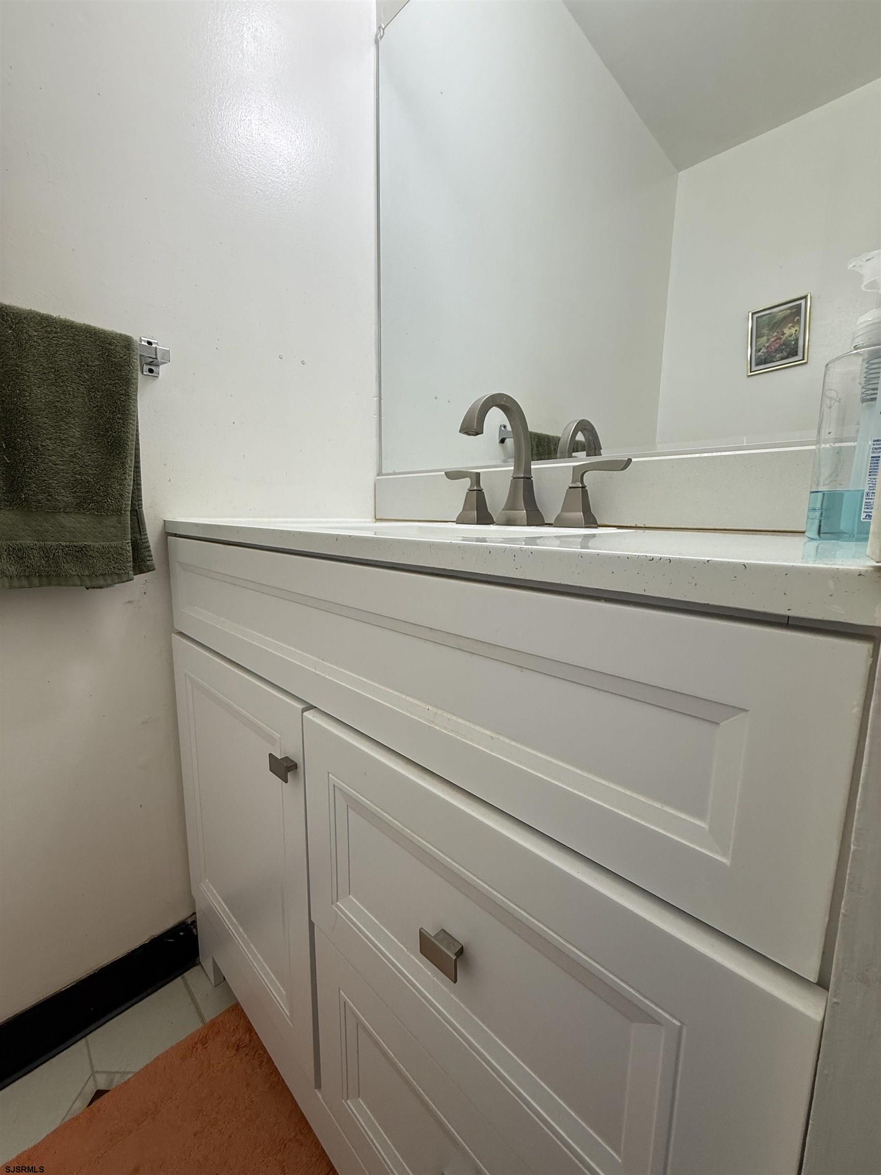 720 South New Road, Unit 3L Absecon, NJ 08201 - Photo 14 of 25 a close view of sink and tap