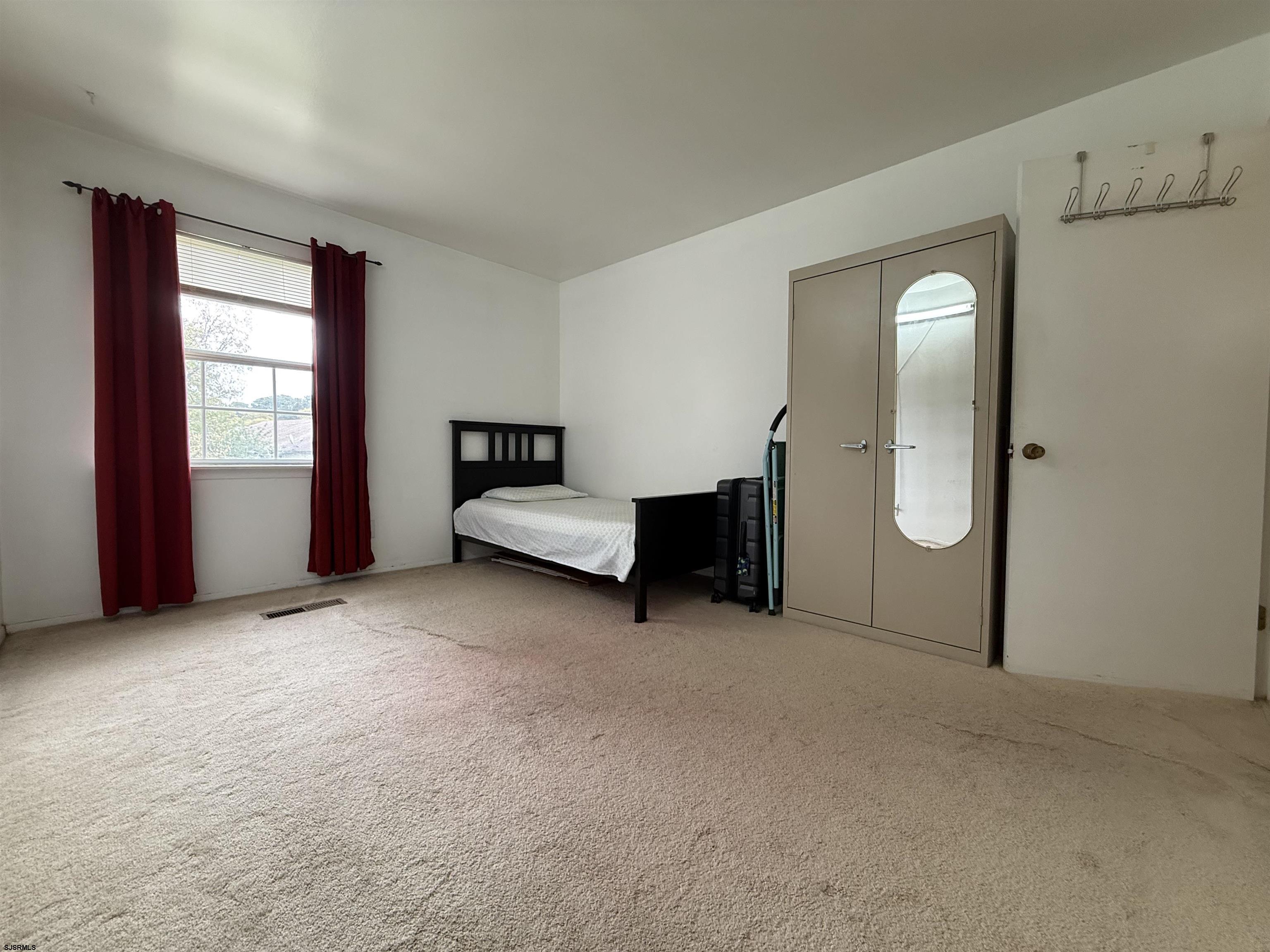 720 South New Road, Unit 3L Absecon, NJ 08201 - Photo 19 of 25 a view of livingroom with furniture and windows