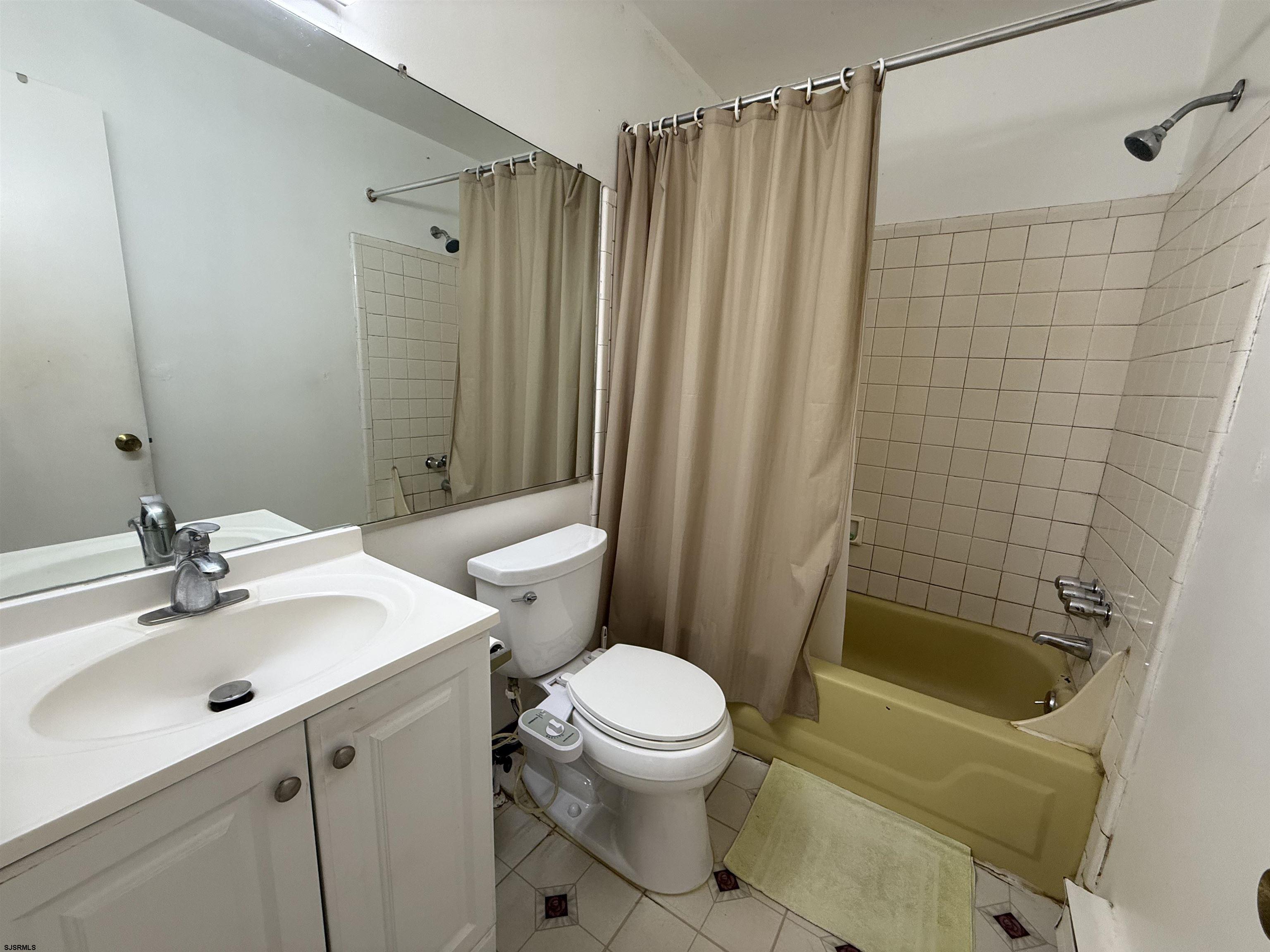 720 South New Road, Unit 3L Absecon, NJ 08201 - Photo 22 of 25 a bathroom with a sink toilet and shower