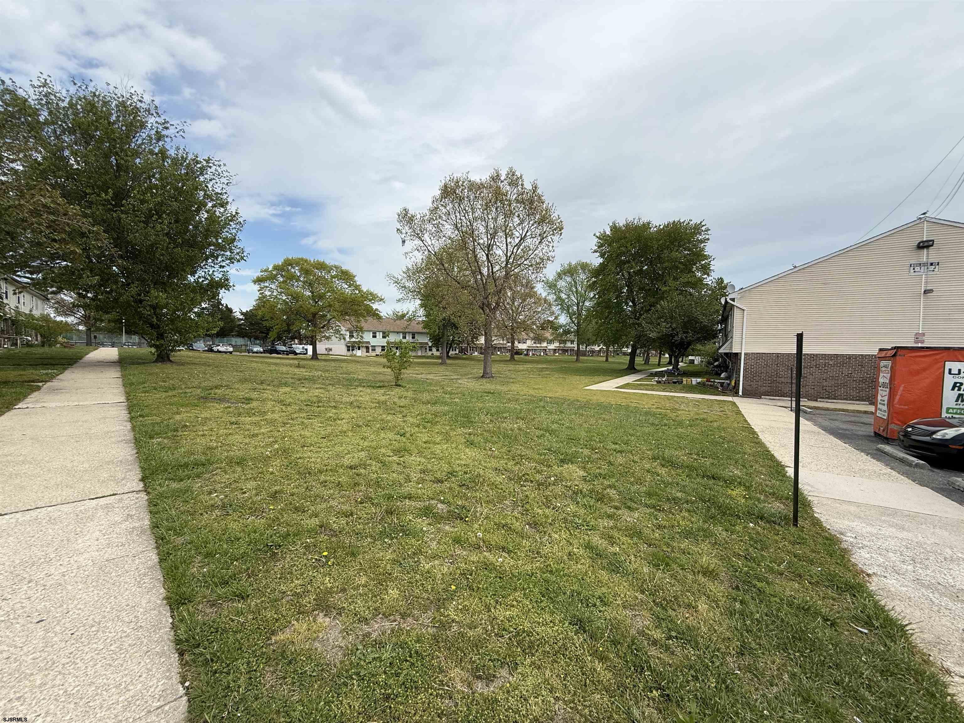 720 South New Road, Unit 3L Absecon, NJ 08201 - Photo 23 of 25 a view of a golf course with parking space