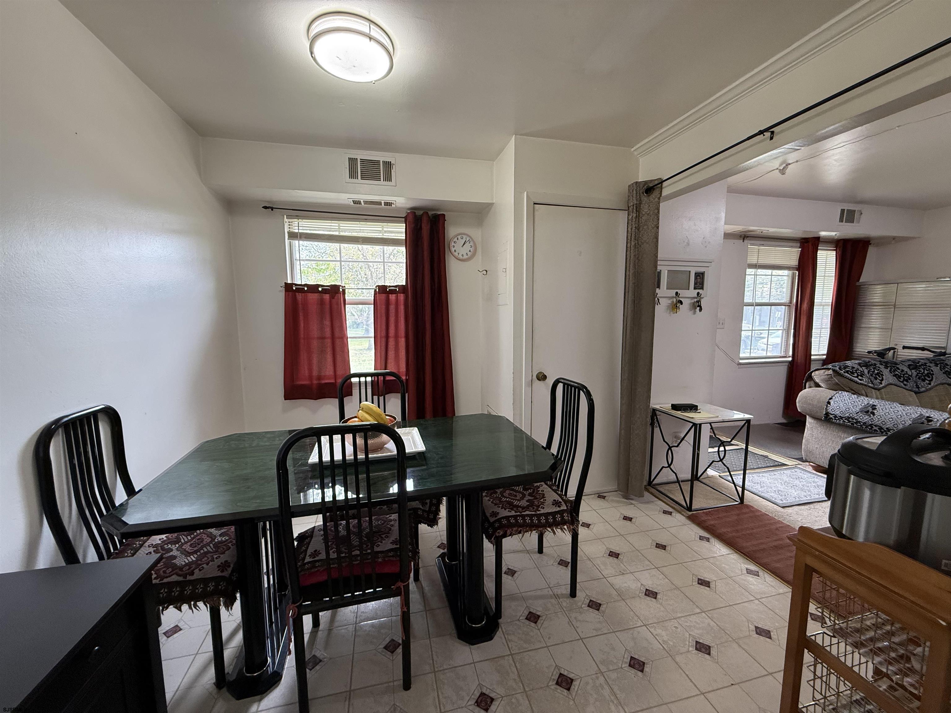 720 South New Road, Unit 3L Absecon, NJ 08201 - Photo 10 of 25 a view of a dining room with furniture and window
