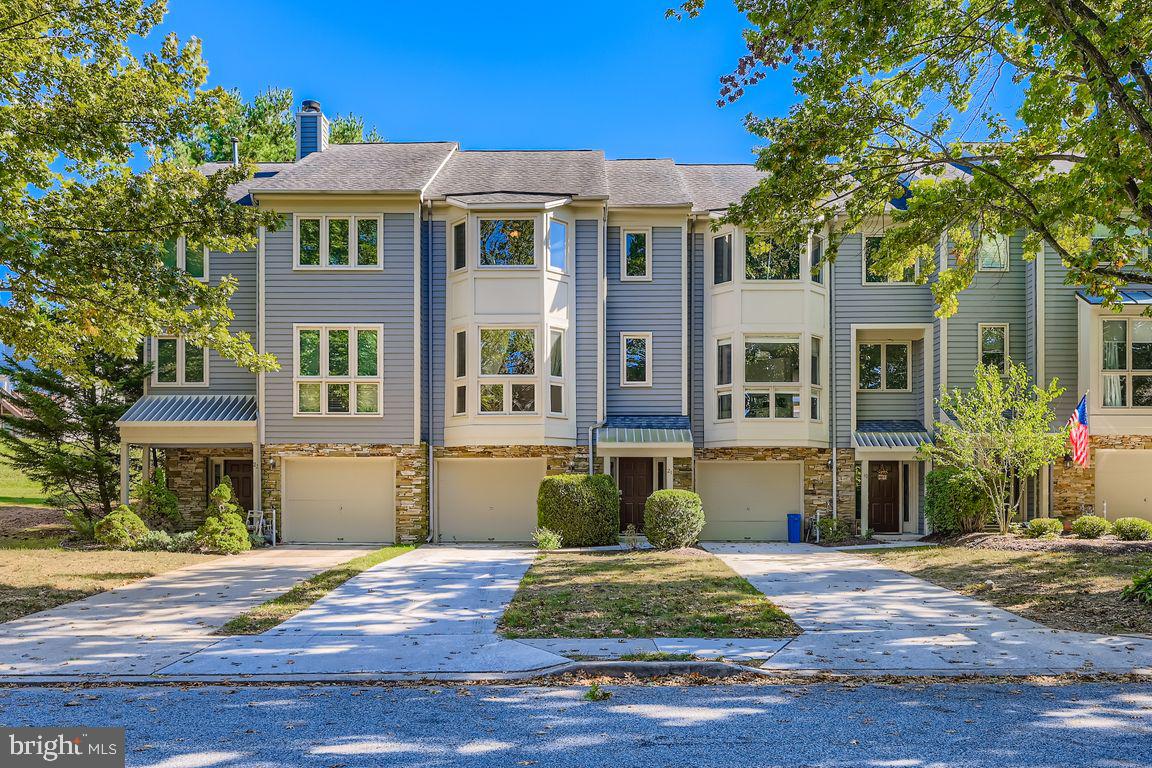 21 Stridesham Court Baltimore, MD 21209 - Photo 1 of 22 a front view of a house with a yard
