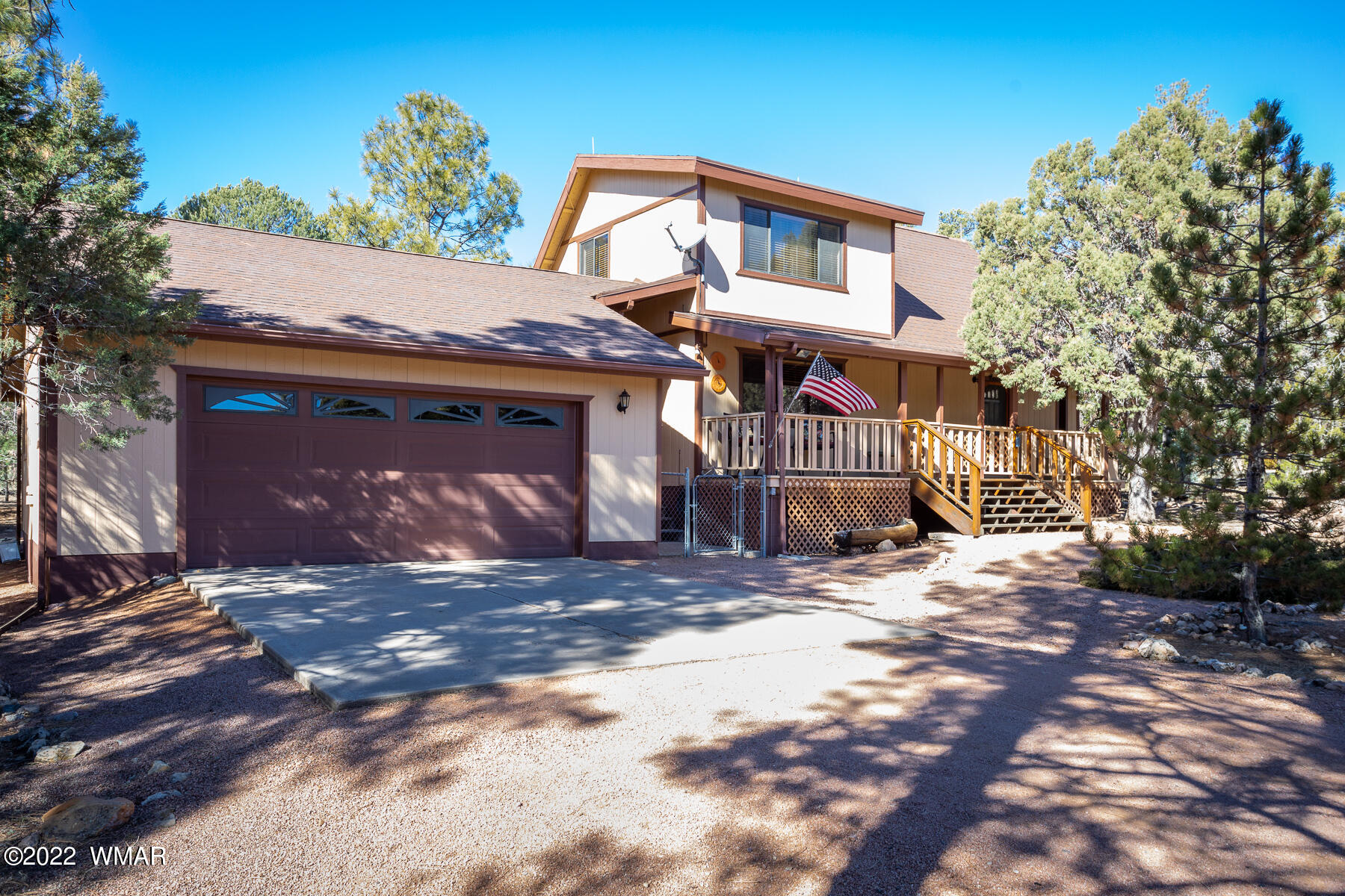 2840 Lodgepole Road Overgaard, AZ 85933 - Photo 1 of 30 a front view of a house with a yard