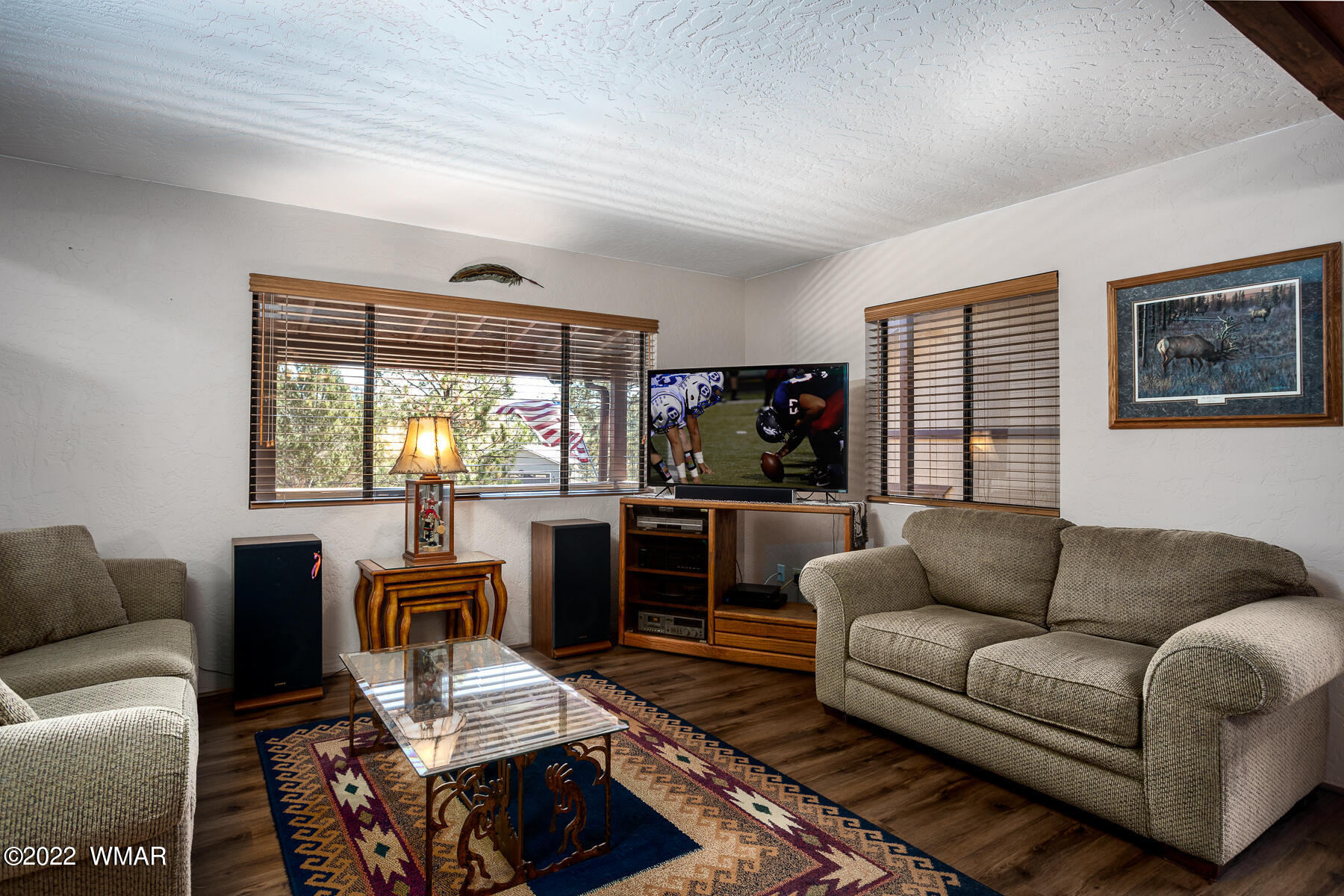 2840 Lodgepole Road Overgaard, AZ 85933 - Photo 11 of 30 a living room with furniture and a flat screen tv