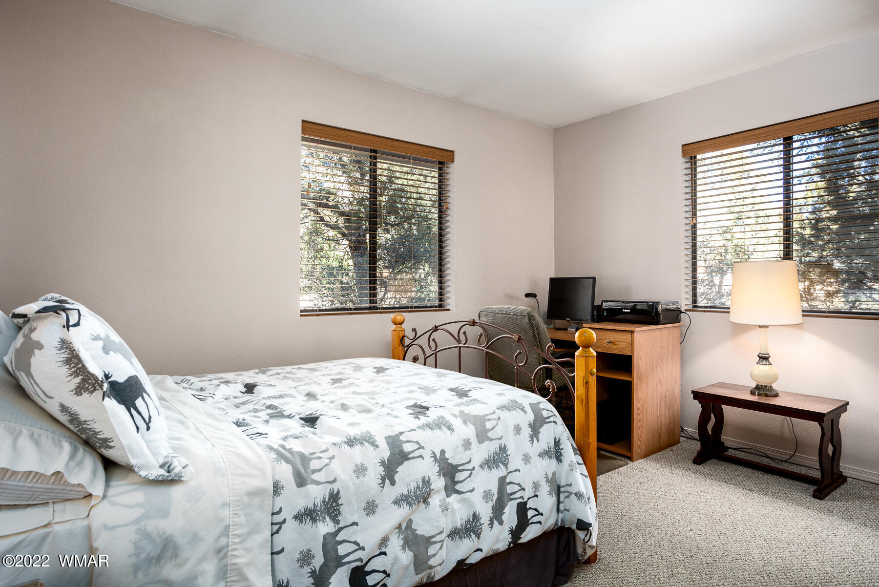2840 Lodgepole Road Overgaard, AZ 85933 - Photo 15 of 30 a bedroom with a bed and a window