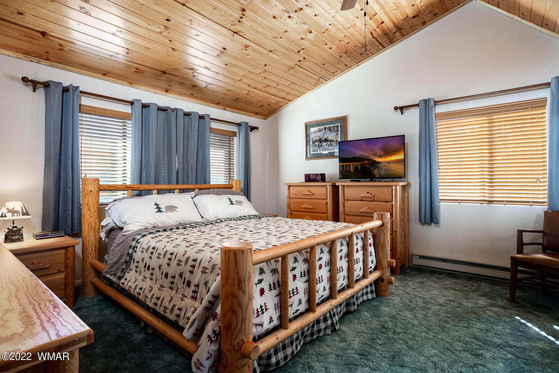 2840 Lodgepole Road Overgaard, AZ 85933 - Photo 19 of 30 a bedroom with bed and windows