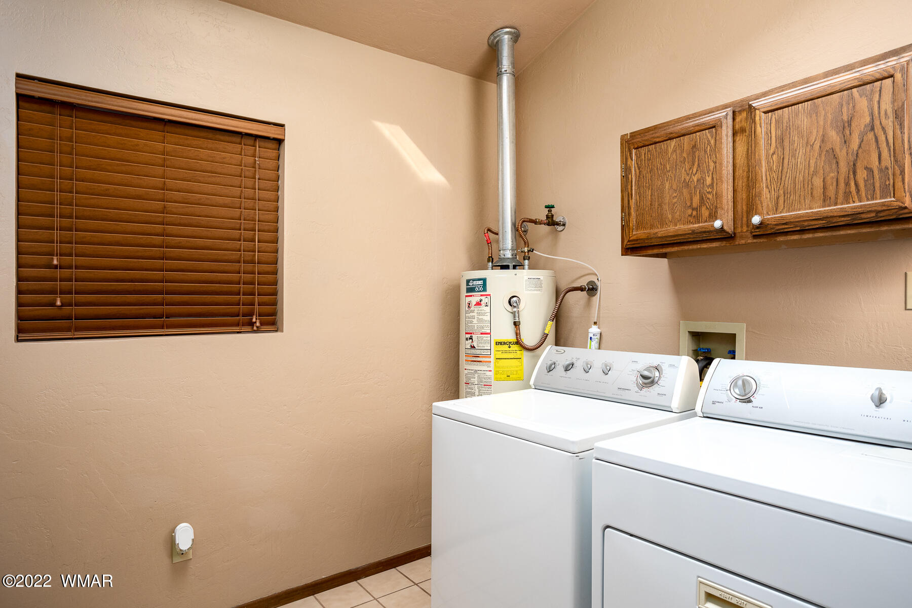 2840 Lodgepole Road Overgaard, AZ 85933 - Photo 21 of 30 a utility room with dryer and washer