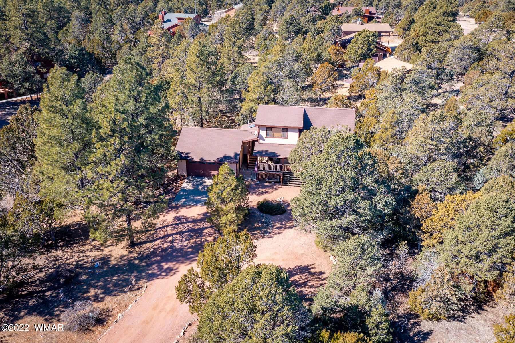 2840 Lodgepole Road Overgaard, AZ 85933 - Photo 24 of 30 a aerial view of a house with a yard