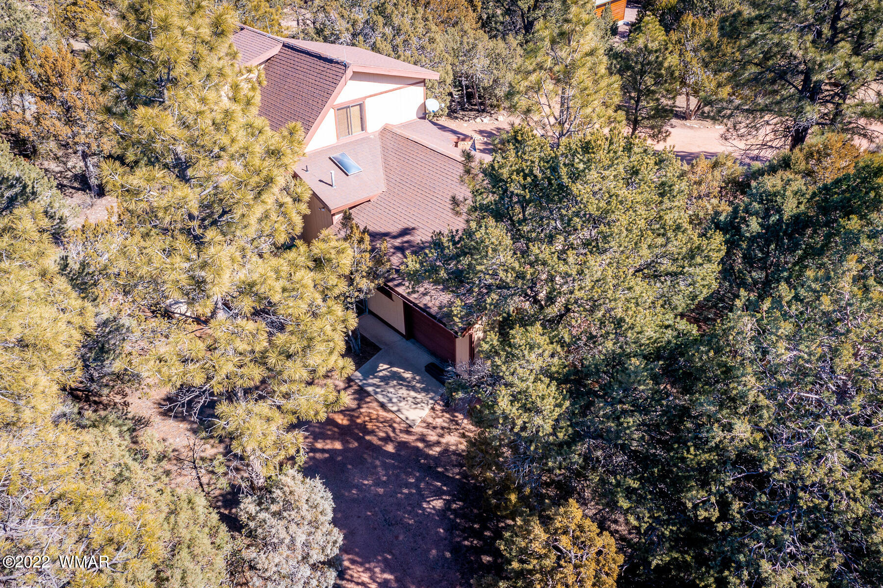 2840 Lodgepole Road Overgaard, AZ 85933 - Photo 27 of 30 a aerial view of a house with a yard