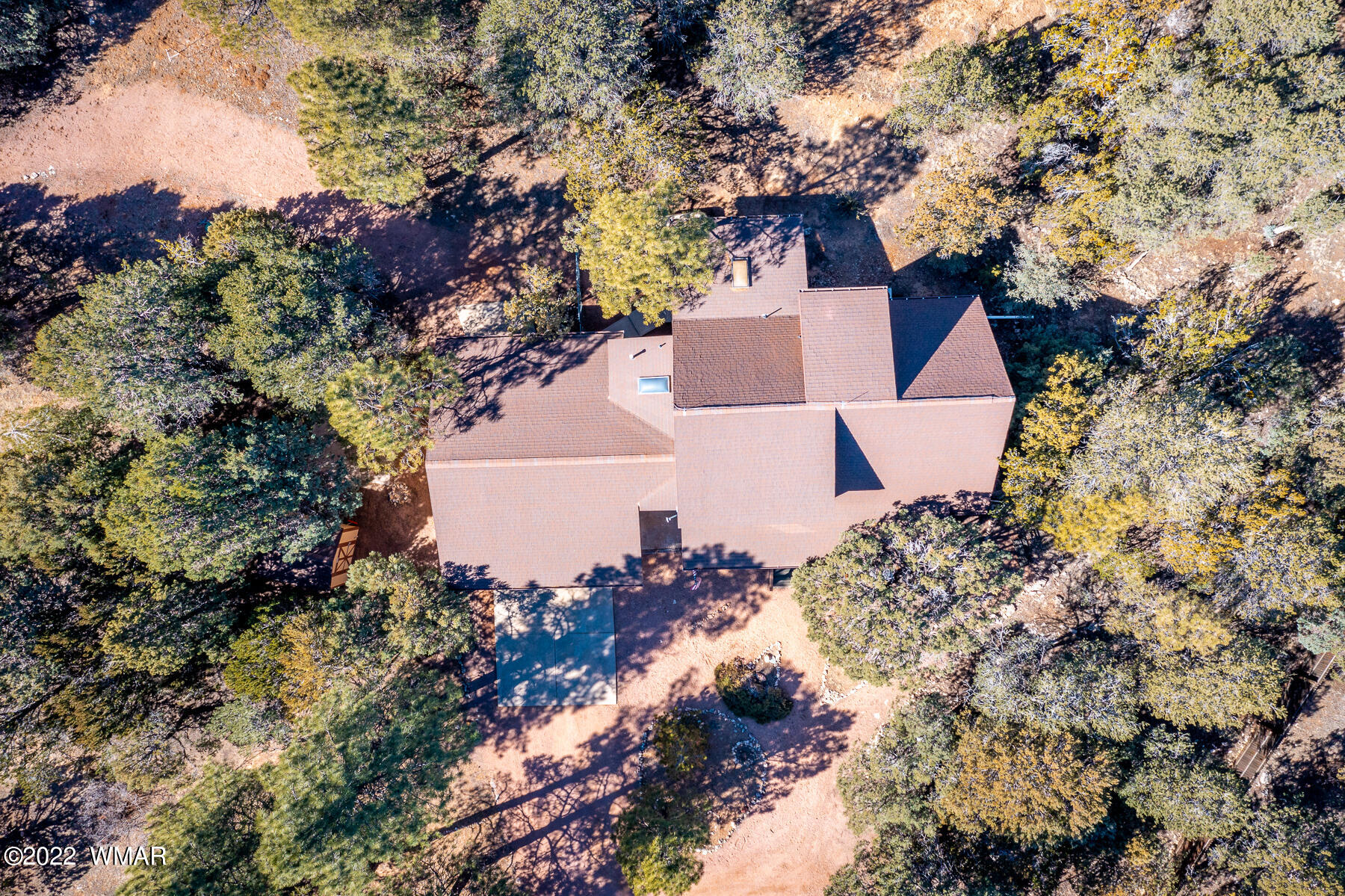 2840 Lodgepole Road Overgaard, AZ 85933 - Photo 28 of 30 an aerial view of house with yard and mountain view in back