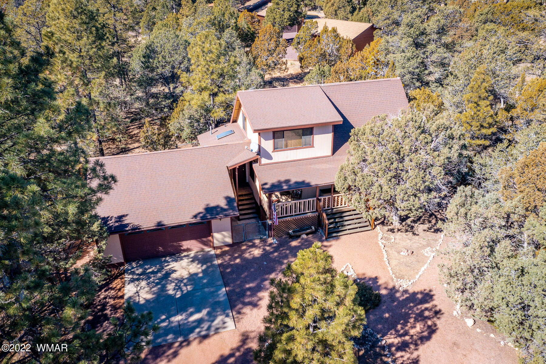 2840 Lodgepole Road Overgaard, AZ 85933 - Photo 30 of 30 an aerial view of a house with a yard