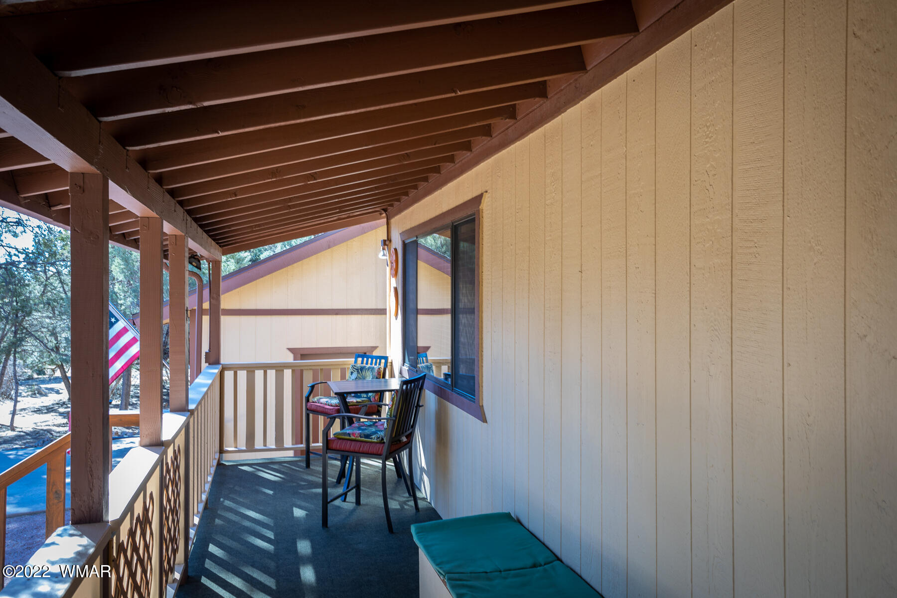 2840 Lodgepole Road Overgaard, AZ 85933 - Photo 8 of 30 a view of chairs in wooden deck