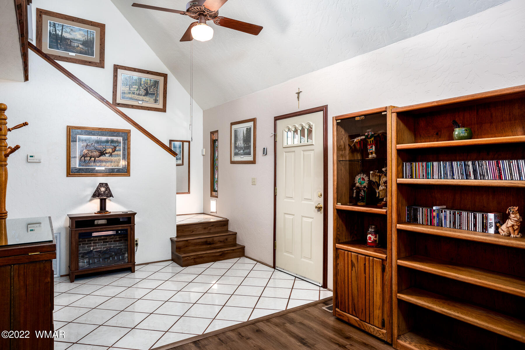 2840 Lodgepole Road Overgaard, AZ 85933 - Photo 10 of 30 a view of a livingroom with furniture and staircase
