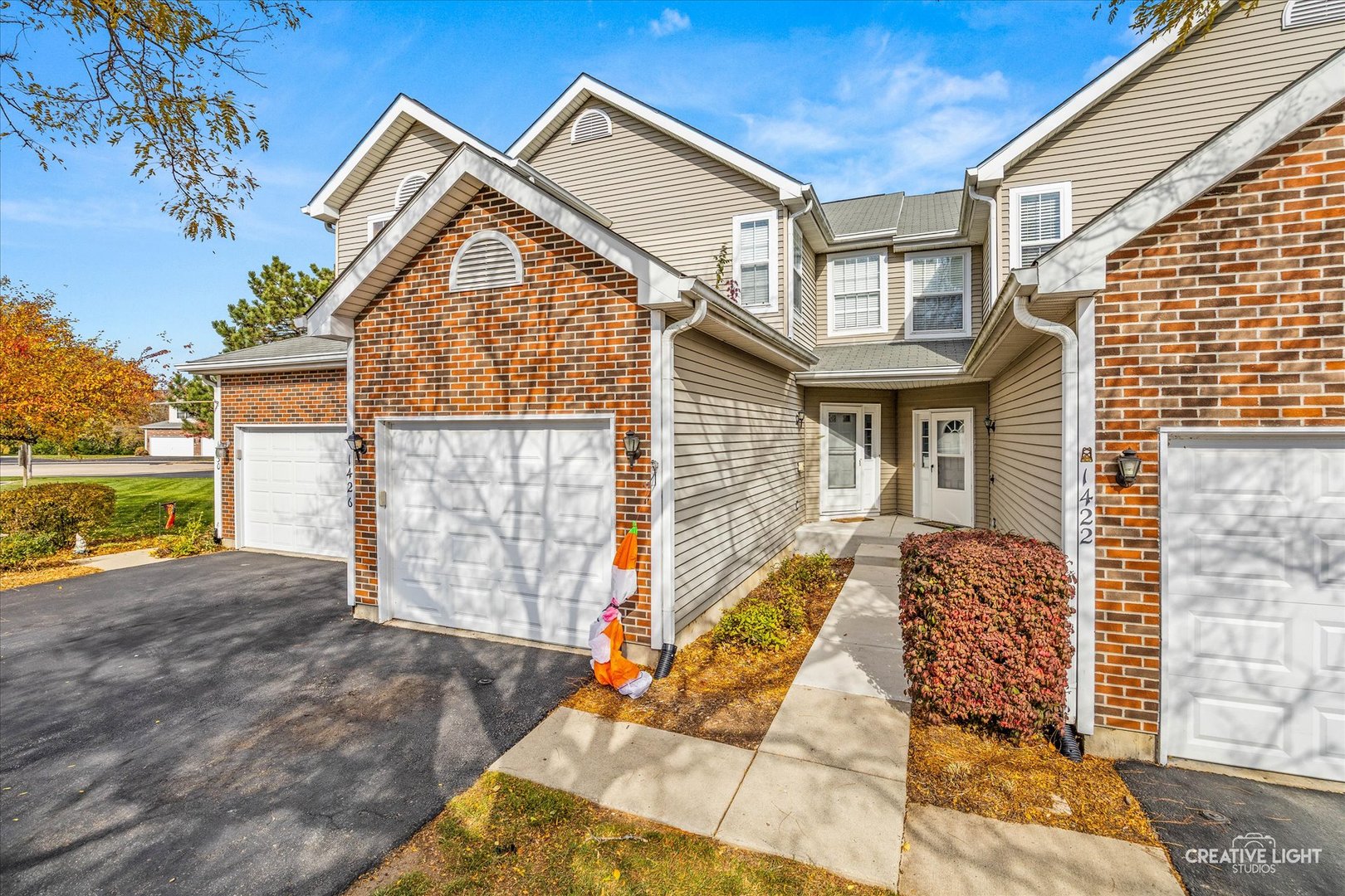 1426 Grandview Court Algonquin, IL 60102 - Photo 1 of 28 a view of backyard with large windows