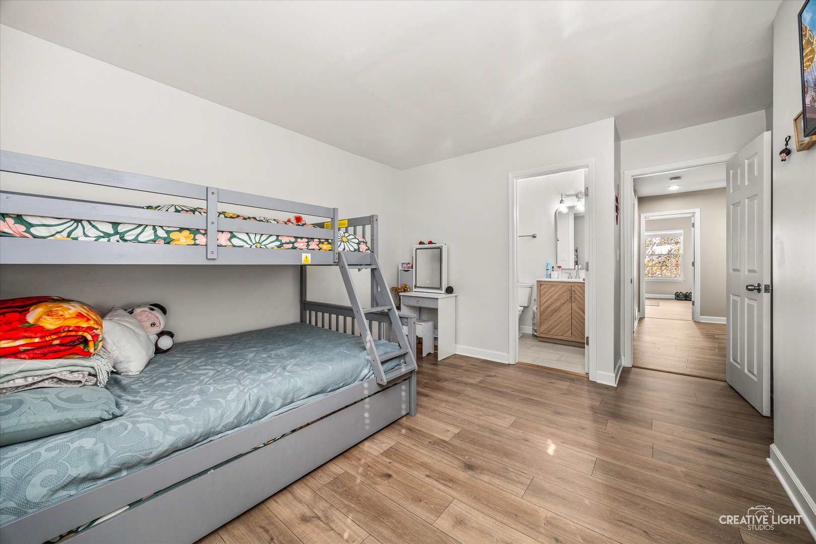 1426 Grandview Court Algonquin, IL 60102 - Photo 11 of 28 a en suite bathroom with a sink and a mirror