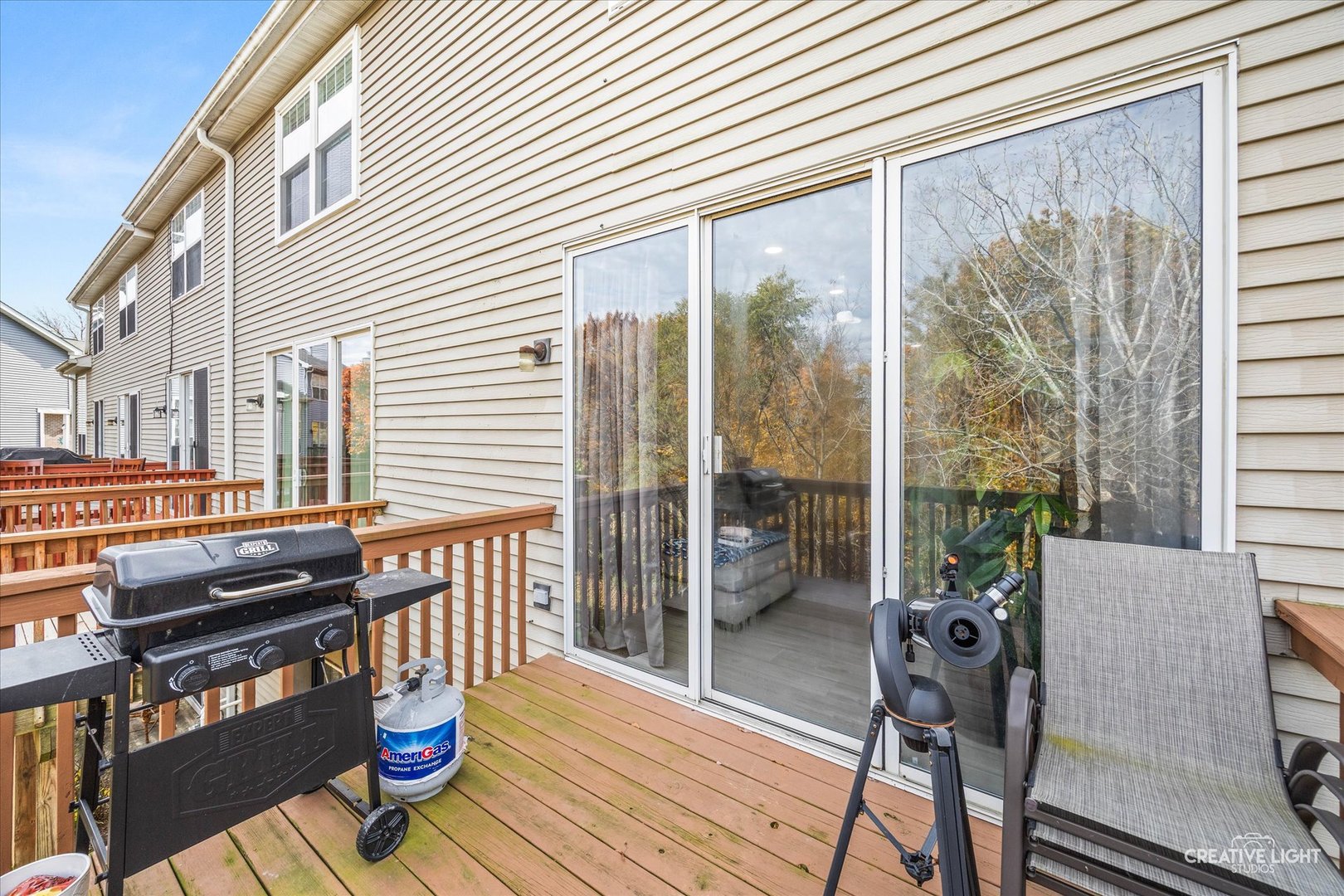 1426 Grandview Court Algonquin, IL 60102 - Photo 26 of 28 a balcony with wooden floor table and chairs