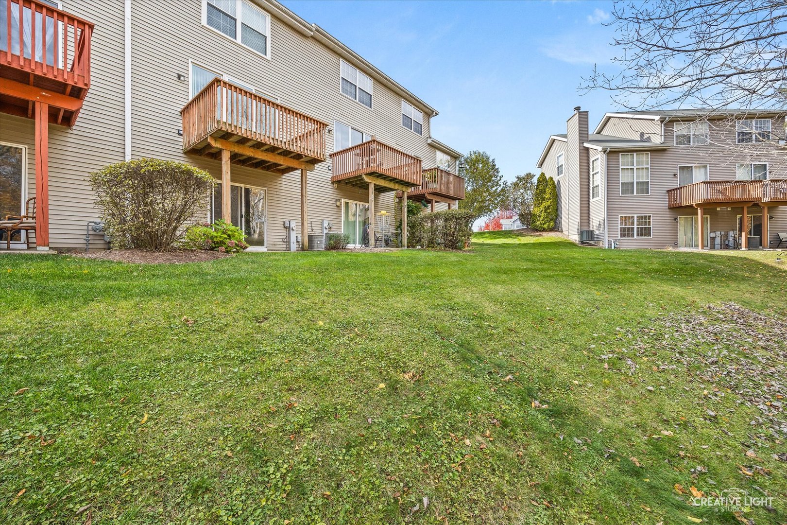 1426 Grandview Court Algonquin, IL 60102 - Photo 28 of 28 a view of a big yard next to a building
