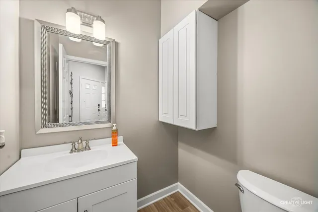 a bathroom with a sink and a toilet