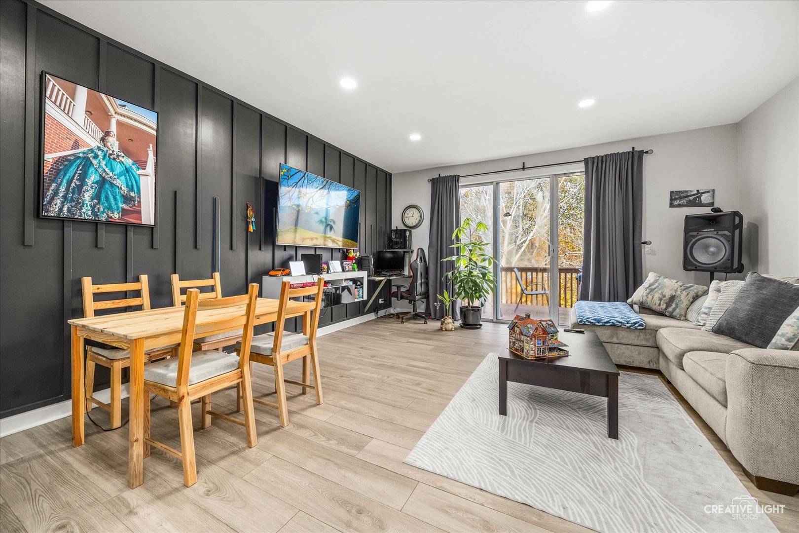 1426 Grandview Court Algonquin, IL 60102 - Photo 5 of 28 a living room with furniture a floor to ceiling window and wooden floor