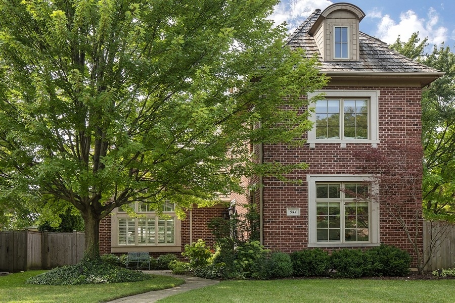 a house view with a garden space