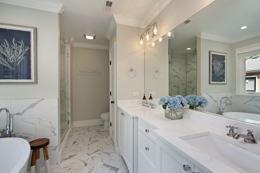 544 Sterling Road Kenilworth, IL 60043 - Photo 12 of 30 a spacious bathroom with a double vanity sink mirror and double
