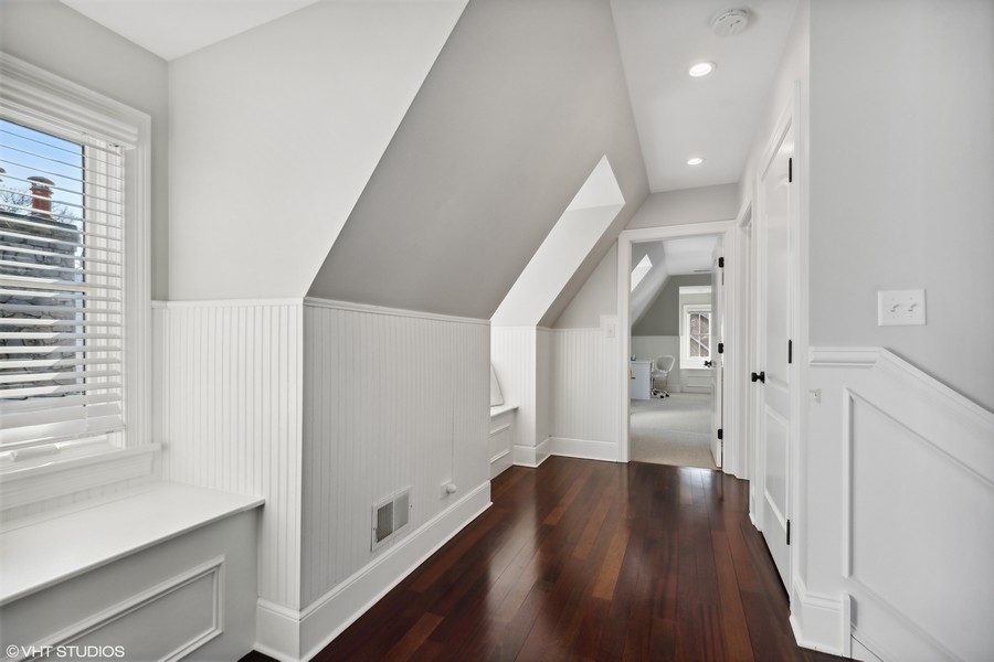 544 Sterling Road Kenilworth, IL 60043 - Photo 17 of 30 a view of a hallway with wooden floor and staircase