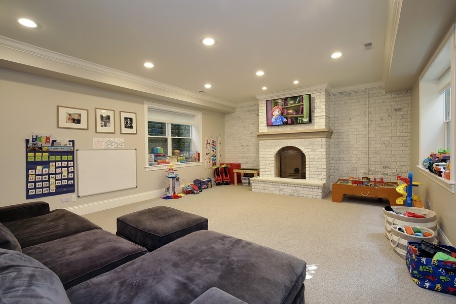 544 Sterling Road Kenilworth, IL 60043 - Photo 19 of 30 a living room with furniture and a fireplace