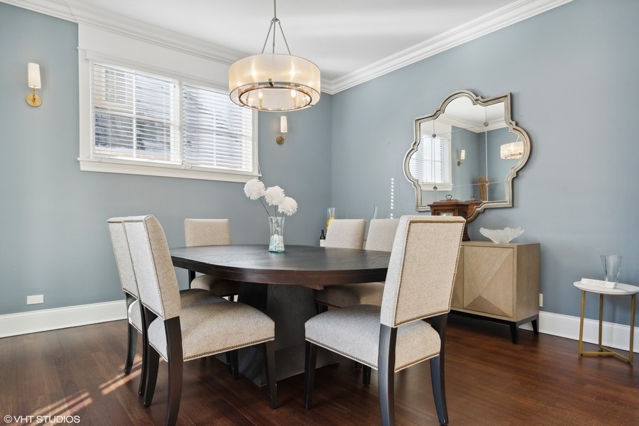 544 Sterling Road Kenilworth, IL 60043 - Photo 7 of 30 a view of a dining room with furniture wooden floor and chandelier