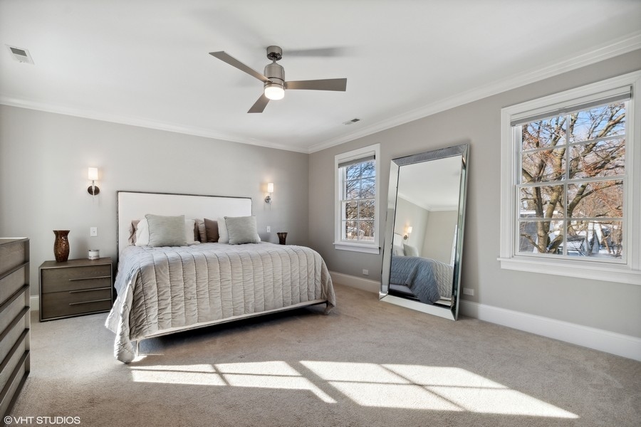 544 Sterling Road Kenilworth, IL 60043 - Photo 10 of 30 a bedroom with a large bed and a window