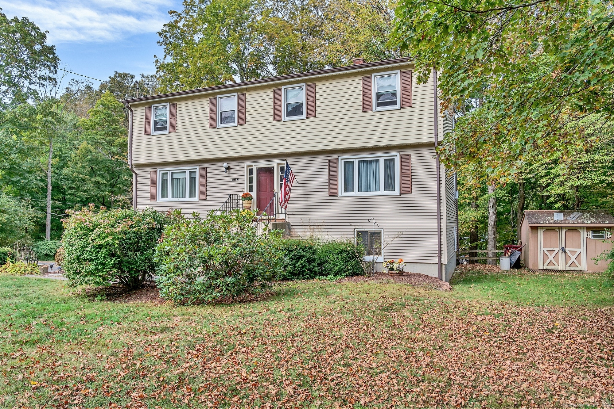223 East Waterbury Road Naugatuck, CT 06770 - Photo 1 of 1 a front view of a house with garden