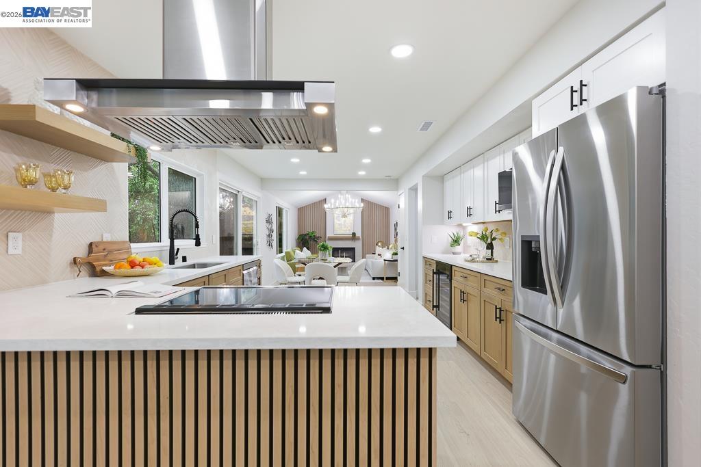 74 Hazelnut Court San Ramon, CA 94583 - Photo 16 of 60 a kitchen with stainless steel appliances granite countertop a refrigerator a sink and a stove