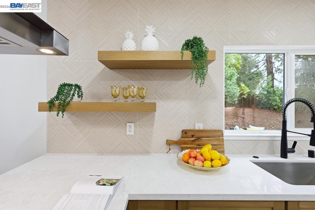74 Hazelnut Court San Ramon, CA 94583 - Photo 17 of 60 a bathroom with a tub sink and mirror