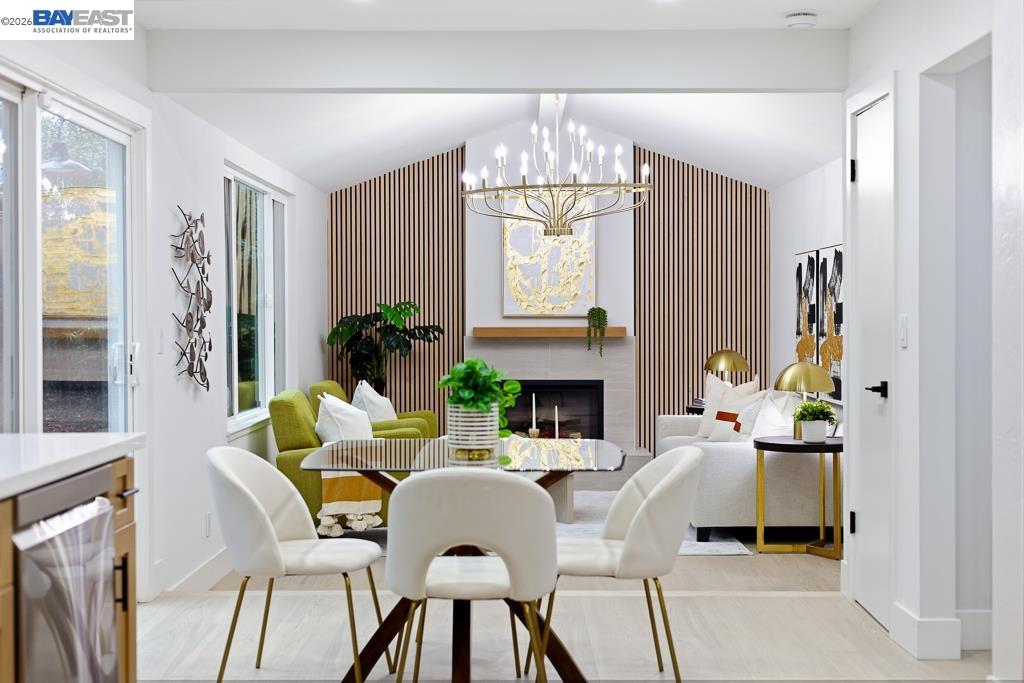 74 Hazelnut Court San Ramon, CA 94583 - Photo 24 of 60 a dining room with furniture a chandelier and a dining table