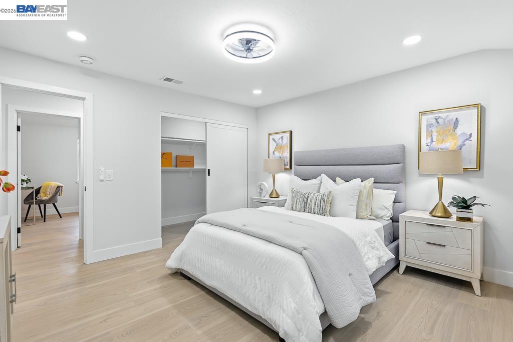 74 Hazelnut Court San Ramon, CA 94583 - Photo 36 of 60 a bedroom with a bed and a table