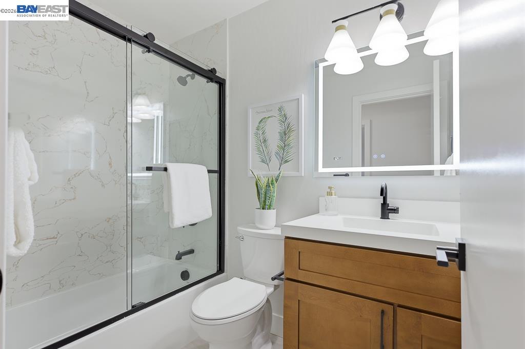 74 Hazelnut Court San Ramon, CA 94583 - Photo 42 of 60 a bathroom with a sink a toilet and shower