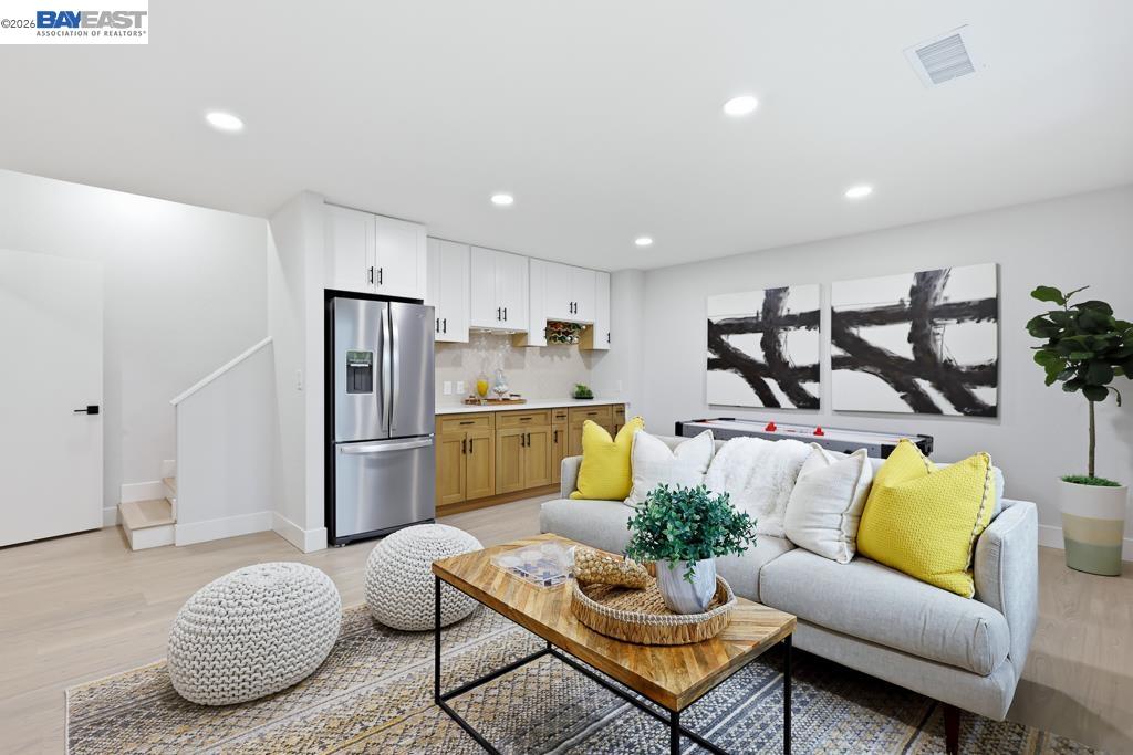 74 Hazelnut Court San Ramon, CA 94583 - Photo 44 of 60 a living room with furniture and kitchen view