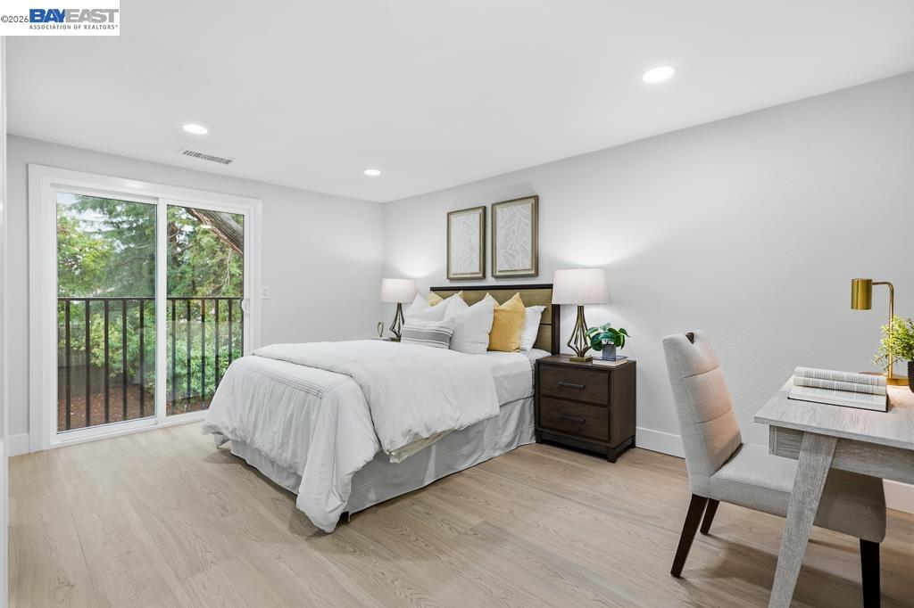 74 Hazelnut Court San Ramon, CA 94583 - Photo 48 of 60 a bedroom with a bed and a desk