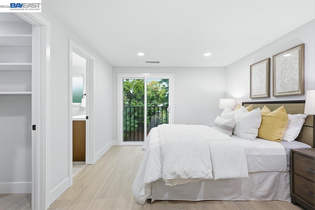 74 Hazelnut Court San Ramon, CA 94583 - Photo 49 of 60 a large white bed in a white room