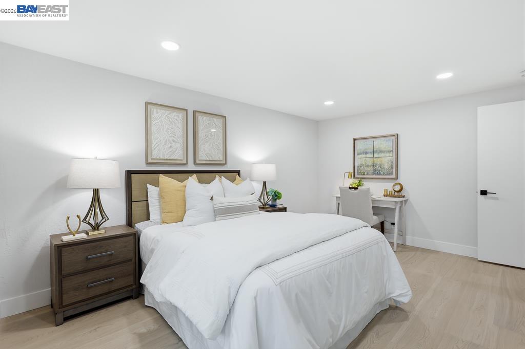 74 Hazelnut Court San Ramon, CA 94583 - Photo 50 of 60 a bedroom with a bed and a table