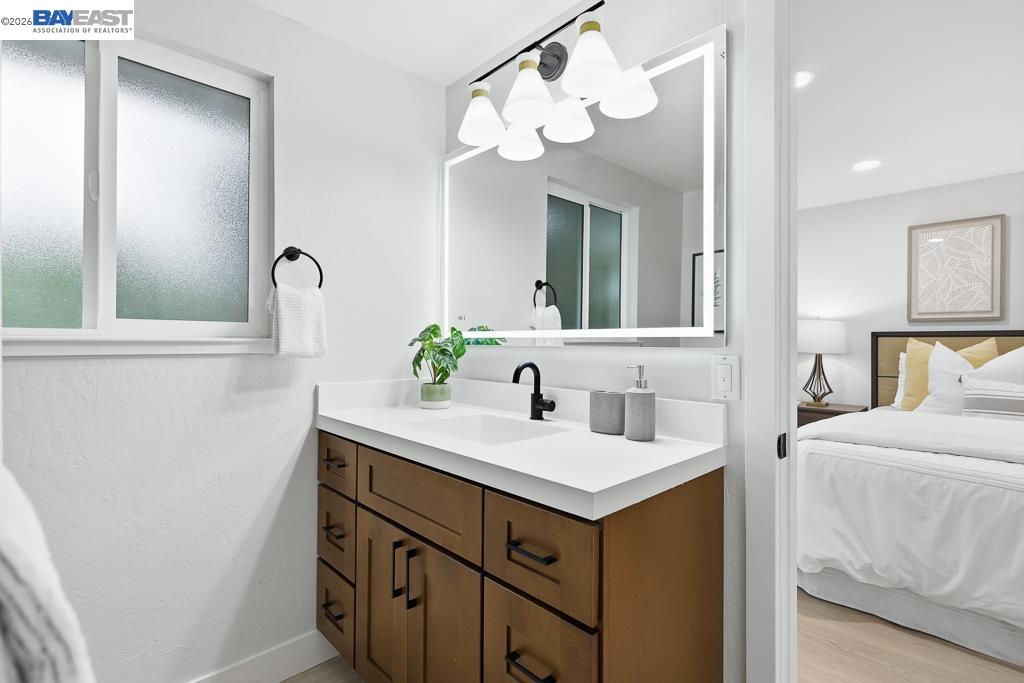 74 Hazelnut Court San Ramon, CA 94583 - Photo 51 of 60 a bathroom with a sink and a mirror