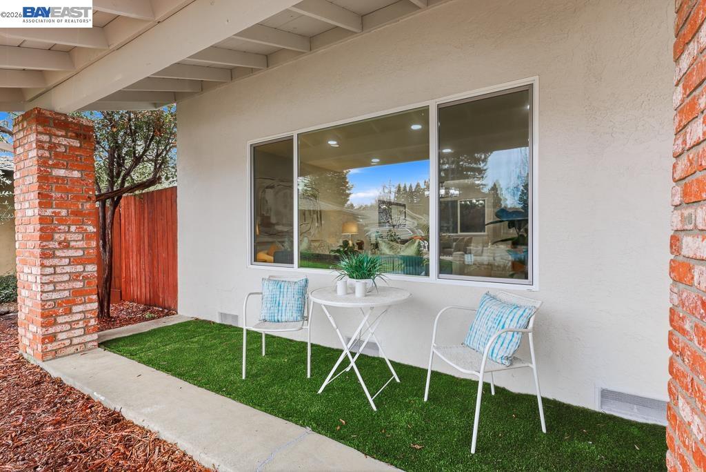 74 Hazelnut Court San Ramon, CA 94583 - Photo 58 of 60 a view of a chair and table in backyard of a house