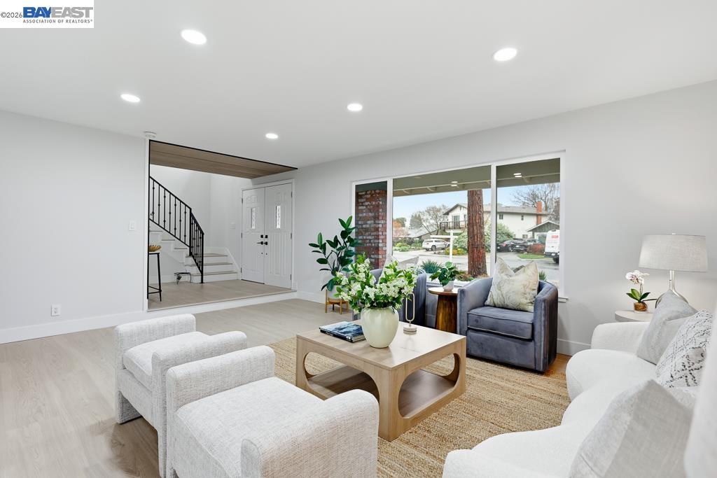 74 Hazelnut Court San Ramon, CA 94583 - Photo 7 of 60 a living room with furniture and a large window