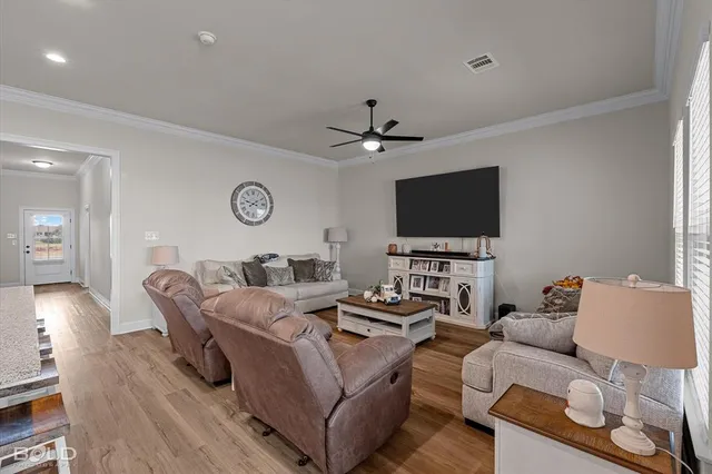 a kitchen with sink stove and refrigerator