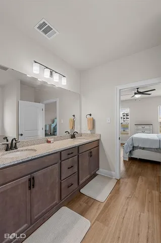 a view of a room with wooden floor and closet