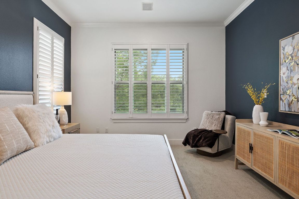 2216 Thornton Road, Unit 431 Austin, TX 78704 - Photo 17 of 30 a bedroom with a bed and a window