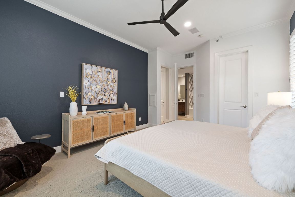 2216 Thornton Road, Unit 431 Austin, TX 78704 - Photo 18 of 30 a bedroom with a bed and a dresser