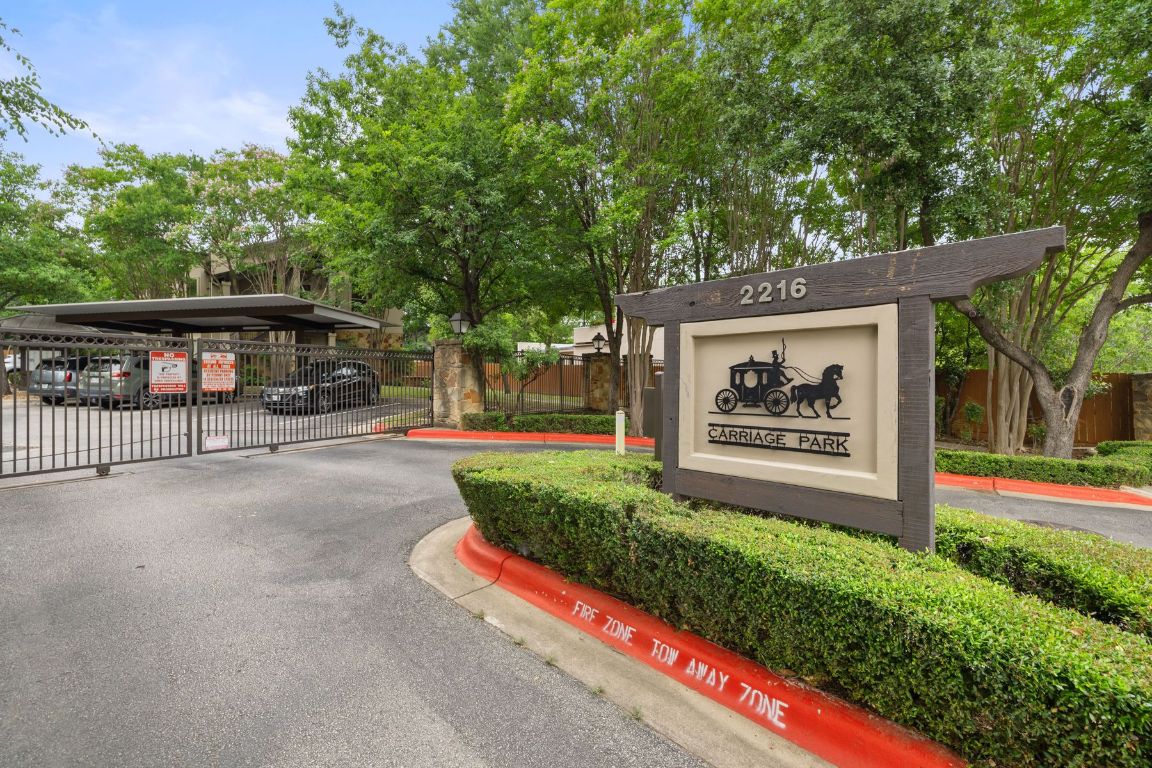 2216 Thornton Road, Unit 431 Austin, TX 78704 - Photo 24 of 30 a view of outdoor space with sign board and garden