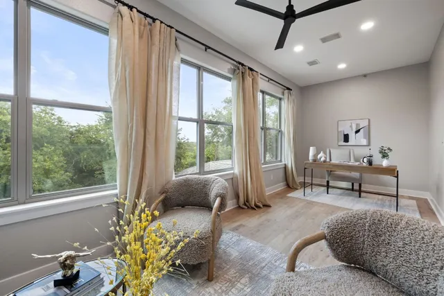 a living room with furniture and a window