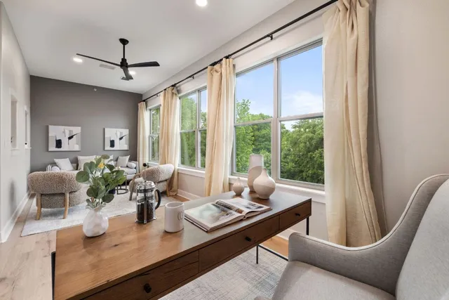a living room with furniture and a window